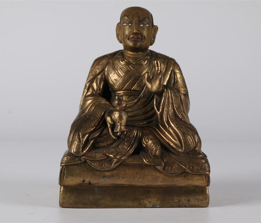 A TIBETAN COPPER GURU BUDDHA STATUE. (1 of 9)