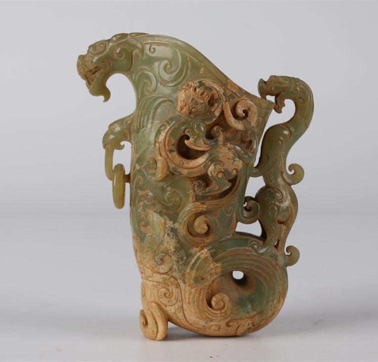 AN ANTIQUE JADE CUP WITH CARVED DRAGON DESIGN. (1 of 8)