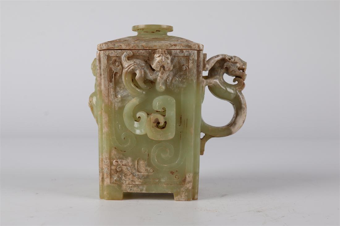AN ANTIQUE JADE LIDDED CUP WITH DRAGON DESIGN. (1 of 7)