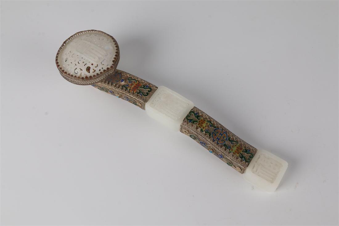 A HETIAN JADE OPENWORK RUYI CARVING ORNAMENT. (1 of 9)