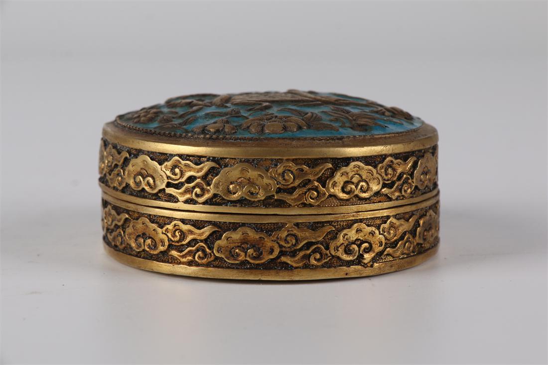 A GILT COPPER LIDDED BOX. (1 of 7)