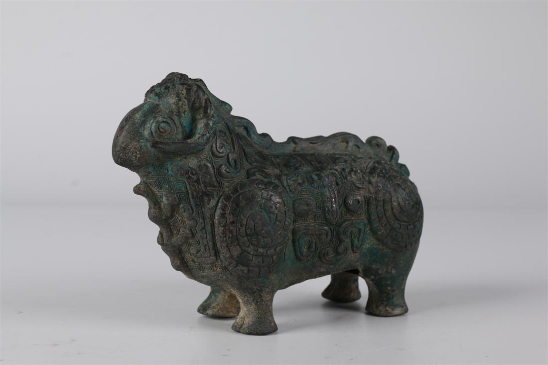A BRONZE SHEEP STATUE ORNAMENT. (1 of 9)