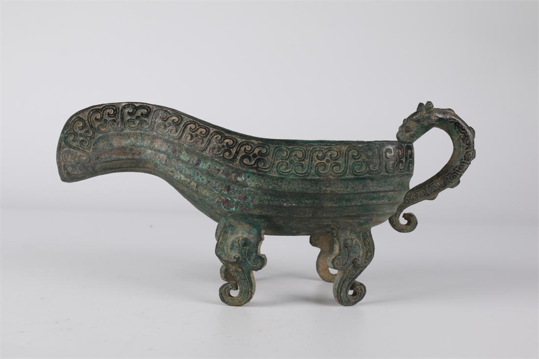 A BRONZE VESSEL "YI". (1 of 9)