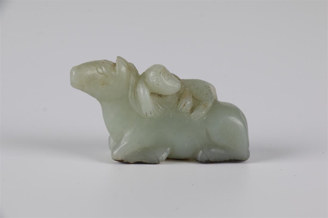 A HETIAN JADE HORSE AND MONKEY CARVING. (1 of 7)