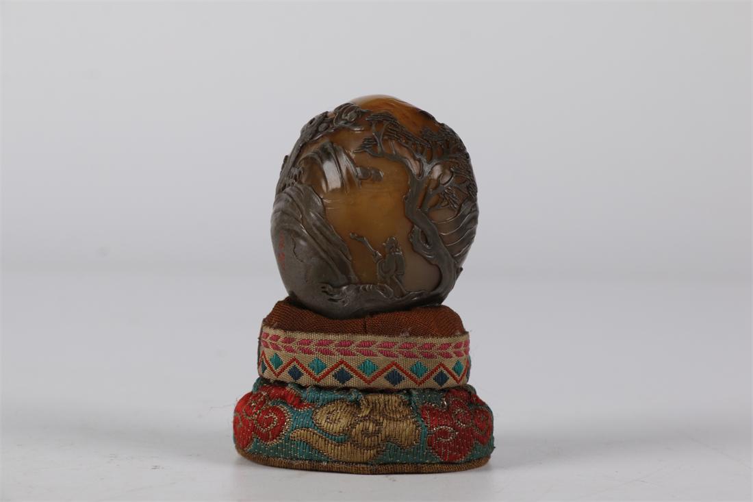 A FIELD-YELLOW STONE HANDHELD CARVING. (1 of 7)