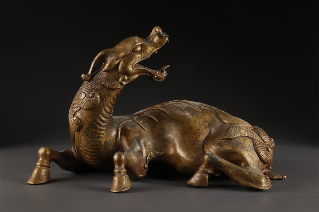 A COPPER AUSPICIOUS BEAST STATUE ORNAMENT. (1 of 9)