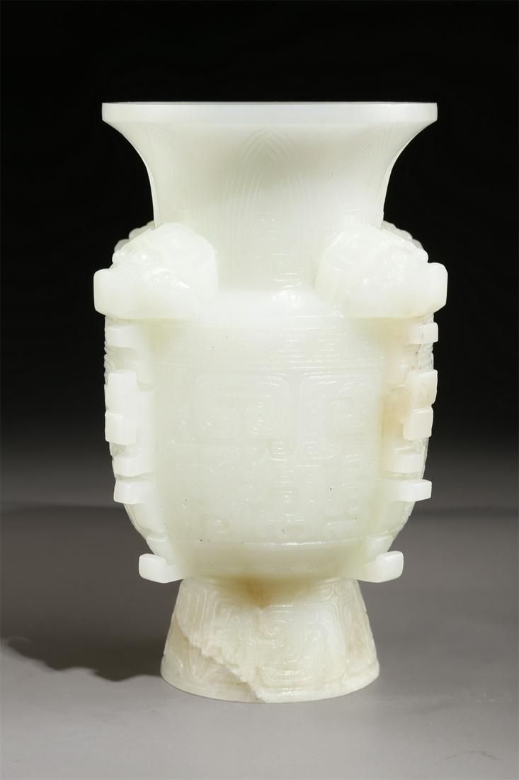 A HETIAN JADE BOTTLE WITH BEAST FACE DESIGN. (1 of 9)