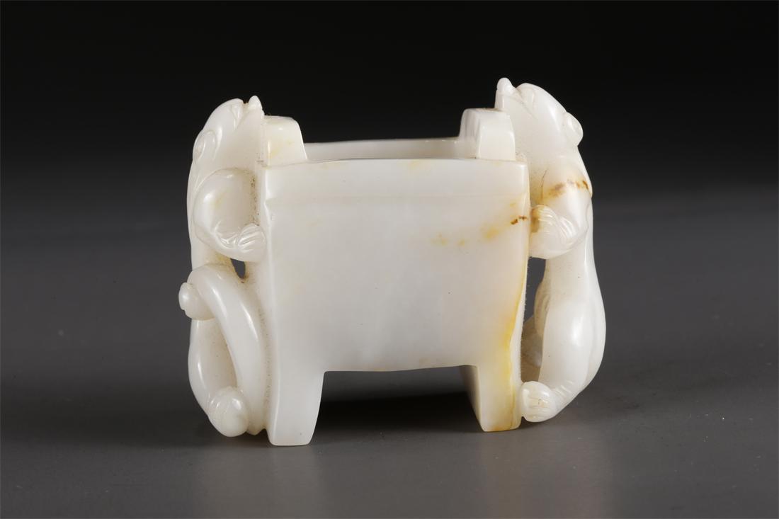 A HETIAN JADE CENSER WITH DRAGON-SHAPED EARS. (1 of 6)