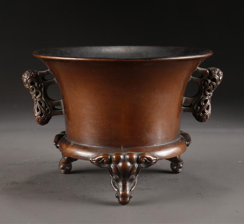 A TWO-EAR COPPER CENSER WITH TRUNK-SHAPED LEGS. (1 of 9)