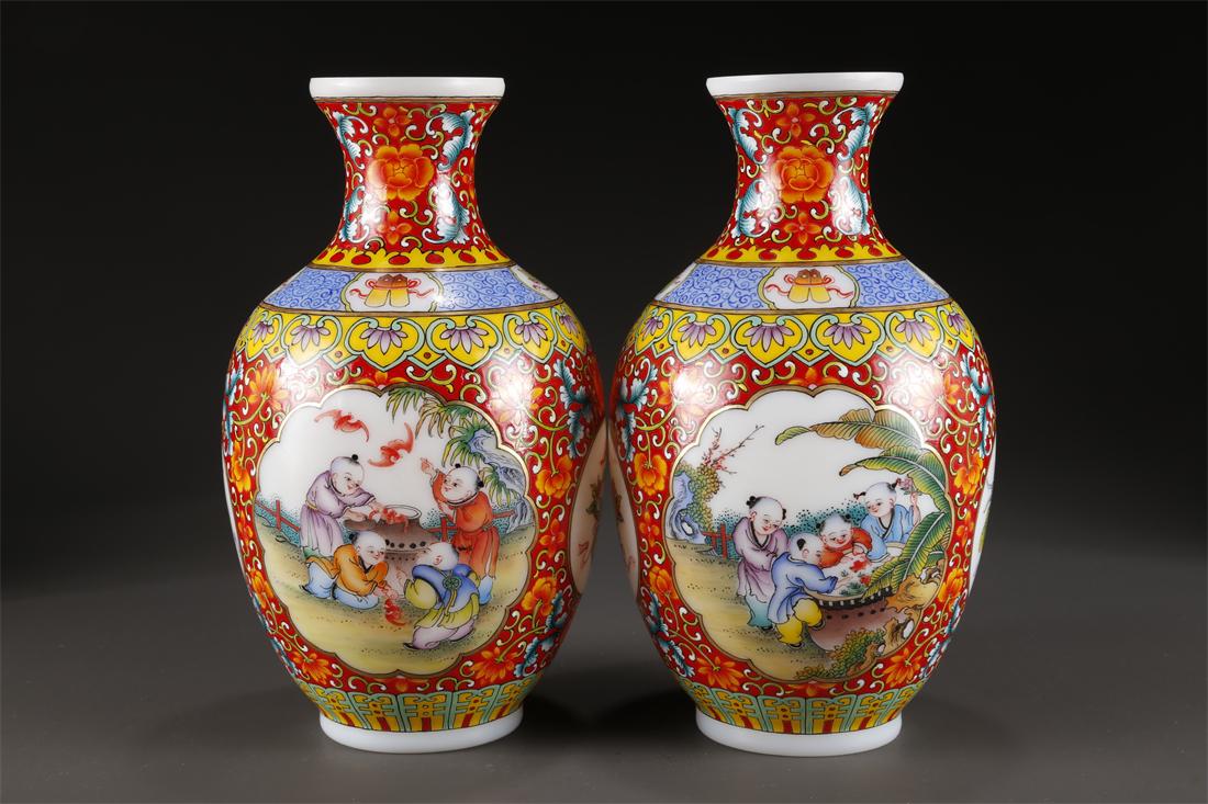 A PAIR OF ENAMELED GLASS DISPLAY BOTTLES. (1 of 9)