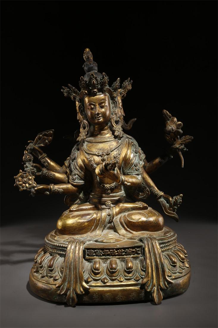 A GILT COPPER NAMGYALMA BUDDHA STATUE. (1 of 9)