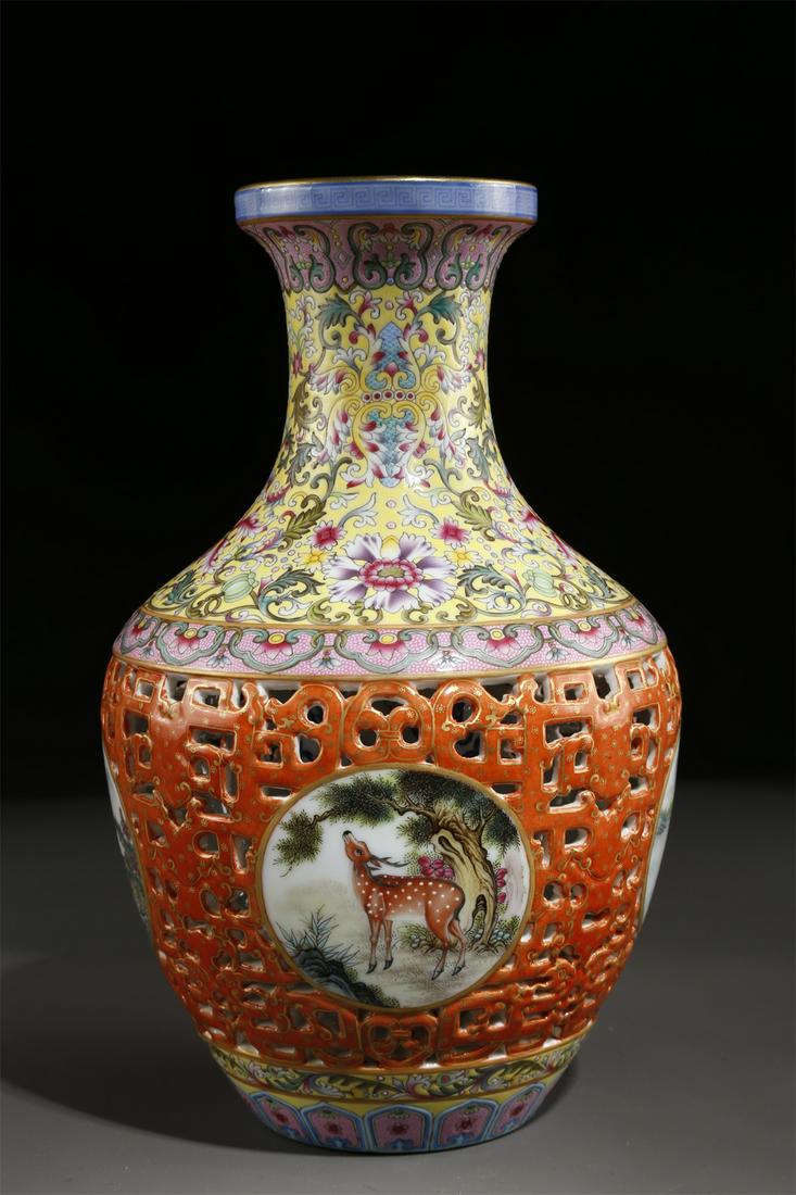 A FAMILLE-ROSE PORCELAIN OPENWORK BOTTLE. (1 of 9)