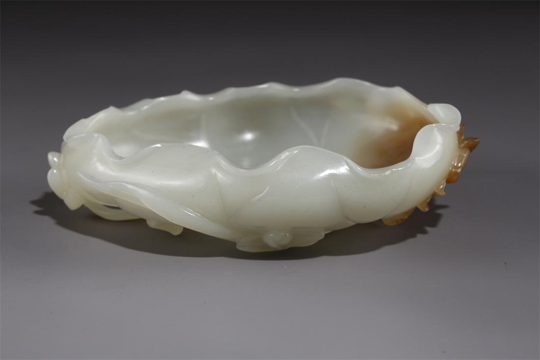 A HETIAN JADE LOTUS-LEAF-SHAPED BRUSH WASHER. (1 of 7)