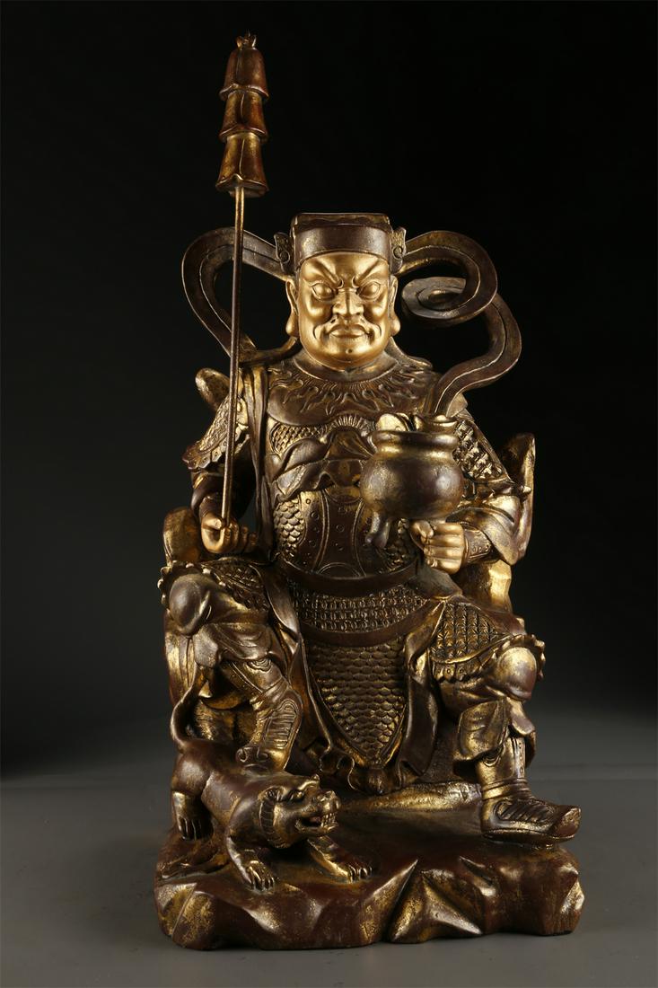 A CAMPHORWOOD HEAVENLY KING STATUE. (1 of 10)