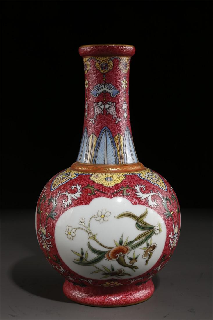 A CARMINE GLAZED PORCELAIN DISPLAY BOTTLE. (1 of 9)