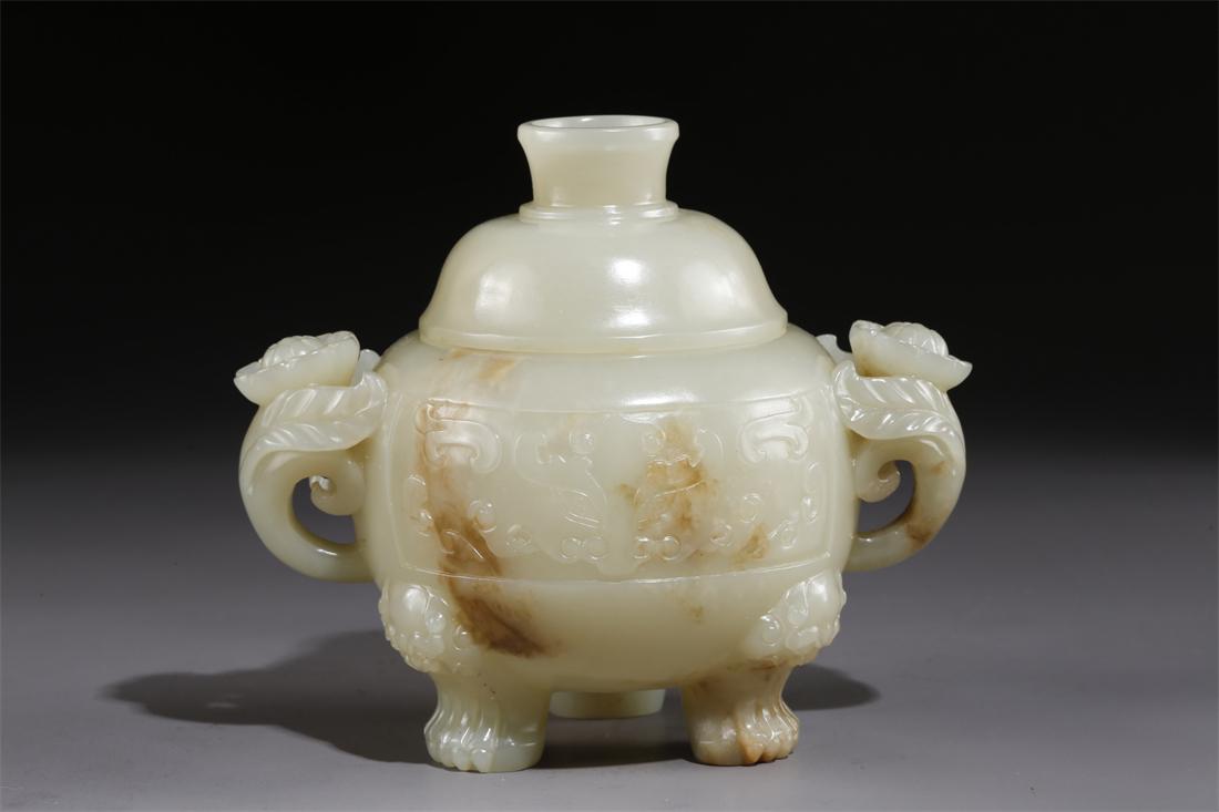 A HETIAN JADE TRIPOD CENSER WITH LID. (1 of 9)