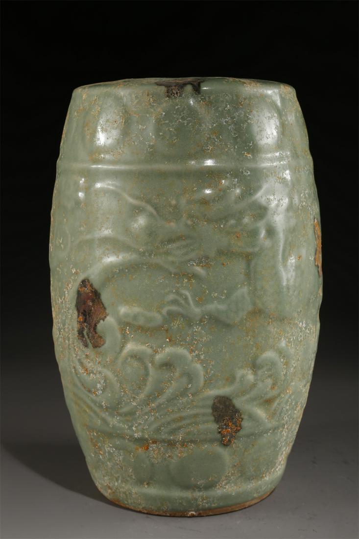 A DRUM-SHAPED PORCELAIN STOOL, LONGQUAN KILN. (1 of 9)