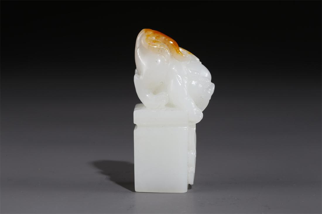 A HETIAN RAW JADE BEAST-KNOB SEAL. (1 of 9)