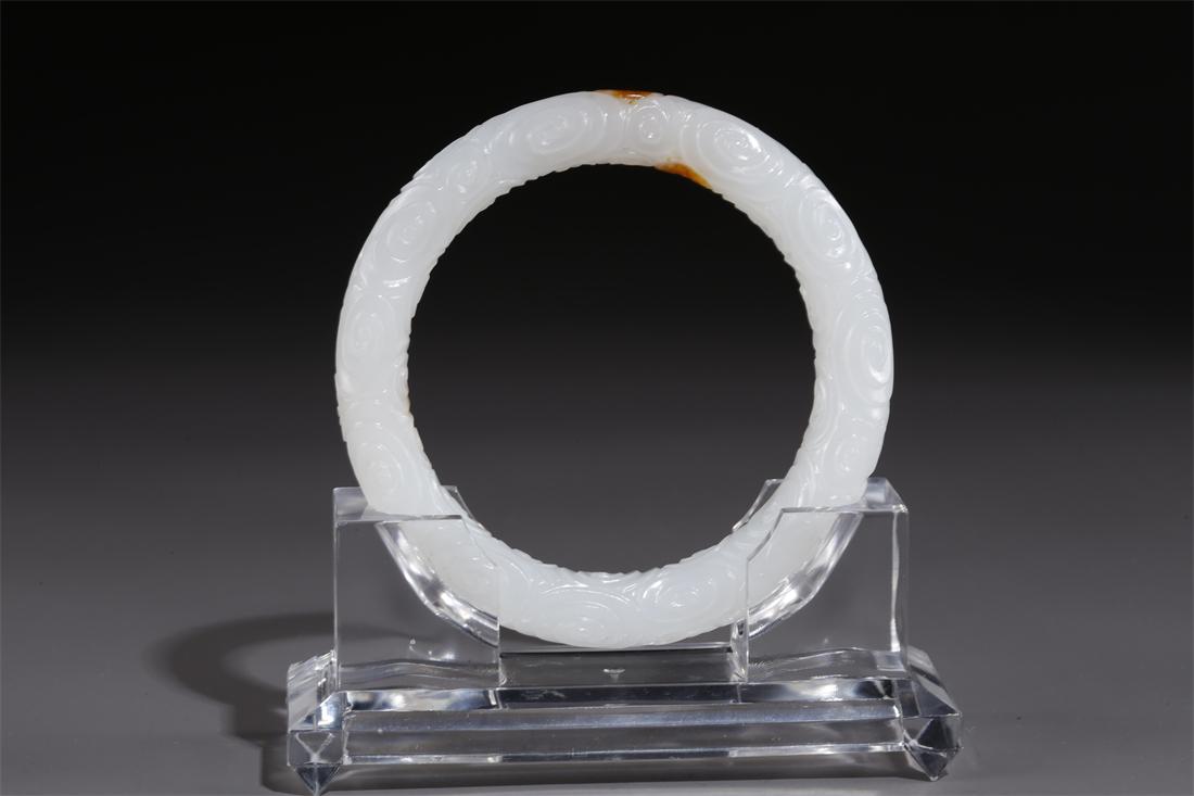 A HETIAN JADE BANGLE. (1 of 7)