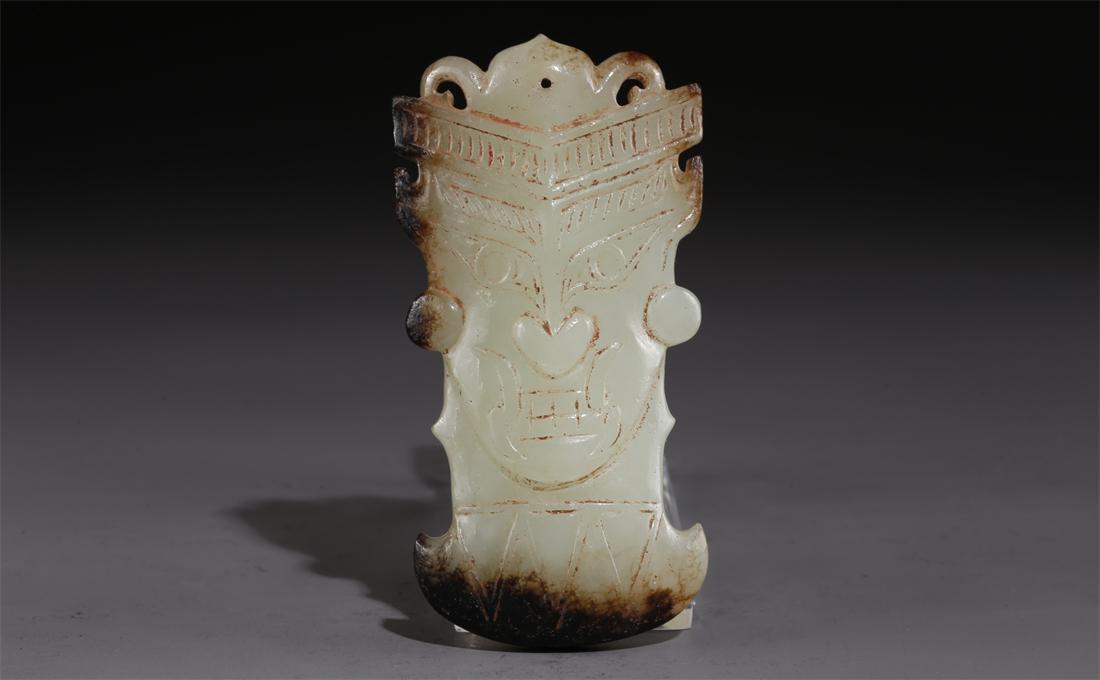 A HETIAN JADE PENDANT WITH BEAST FACE DESIGN. (1 of 8)