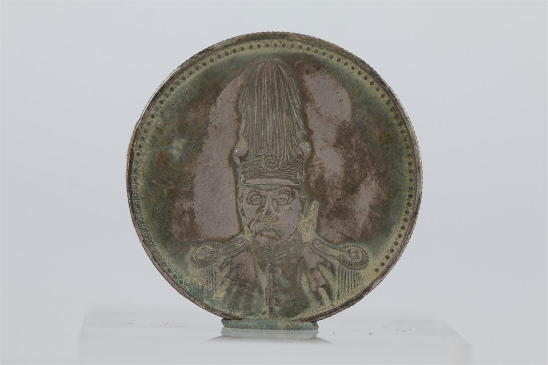 A COMMEMORATIVE ONE-YUAN SILVER COIN. (1 of 5)