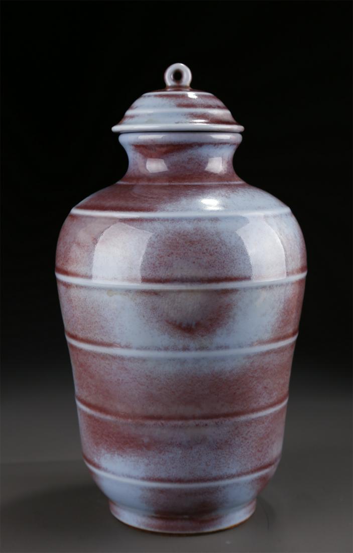 A TRANSMUTATION GLAZED PORCELAIN BOTTLE. (1 of 9)