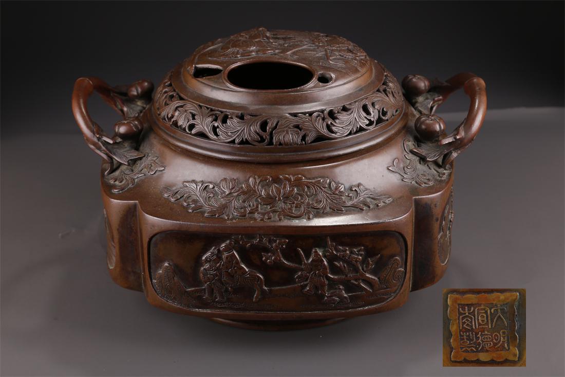 A BRONZE INCENSE BURNER WITH FIGURE DESIGN. (1 of 10)