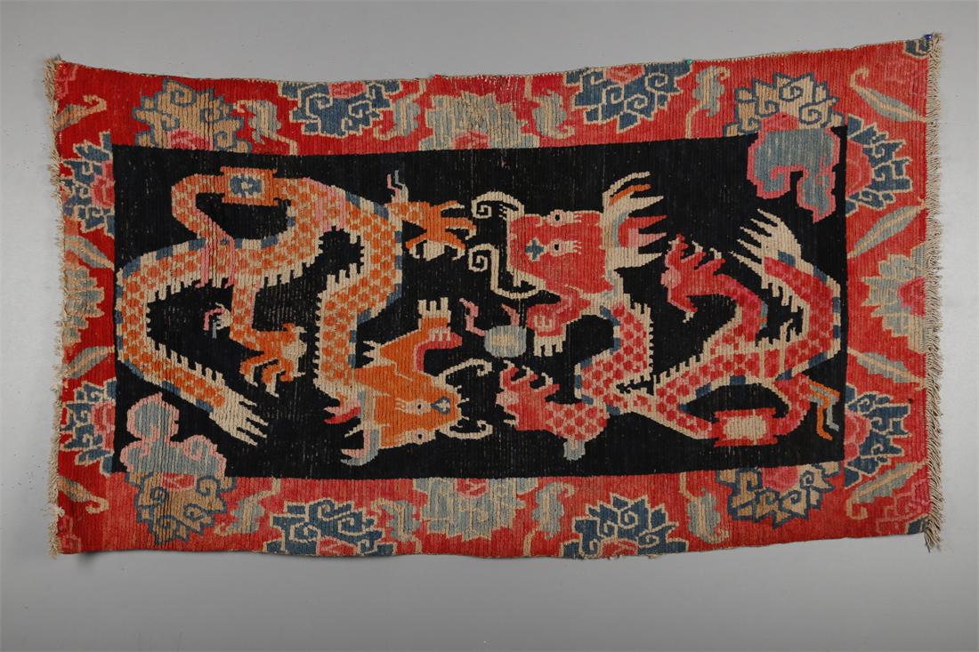 A WOOL CARPET WITH DRAGON DESIGN. (1 of 9)