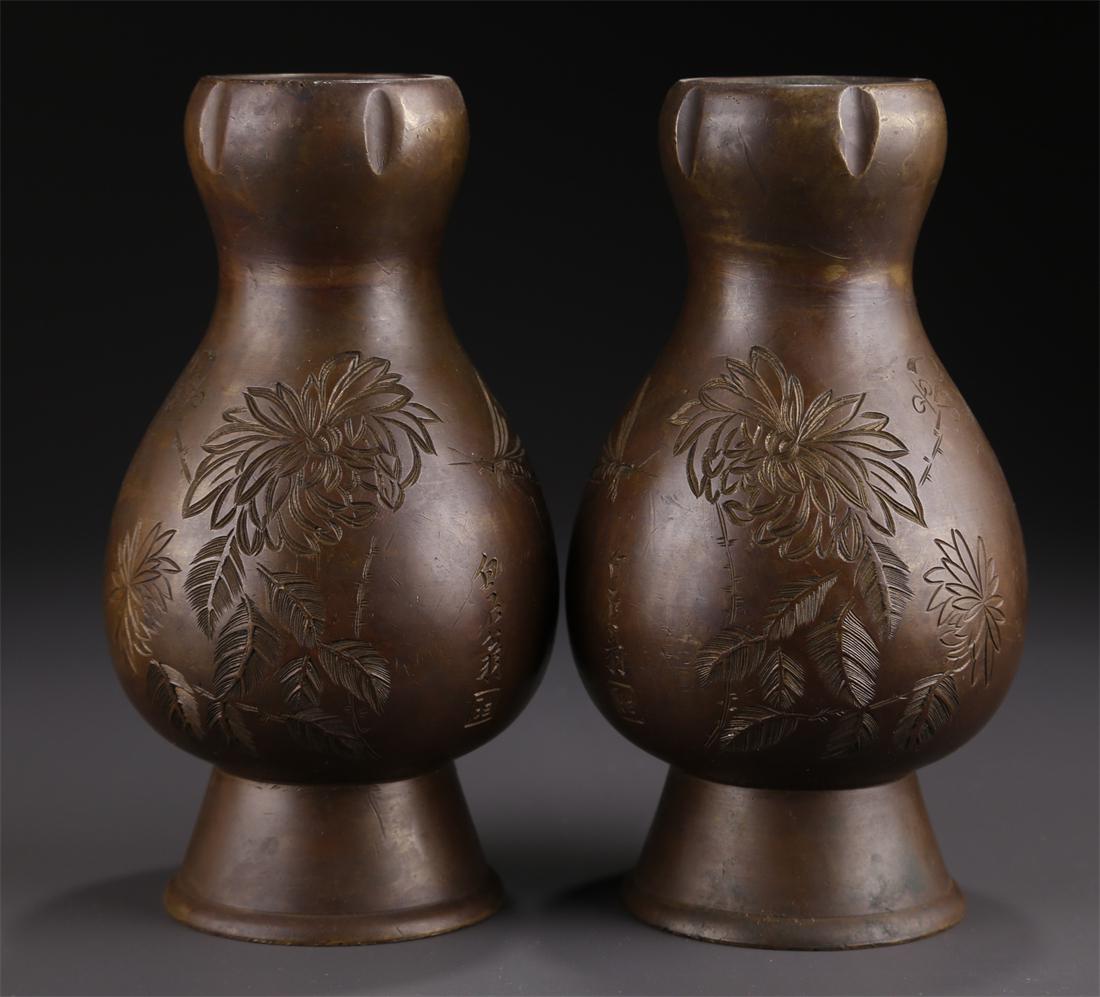 A PAIR OF BRONZE DISPLAY BOTTLES. (1 of 9)