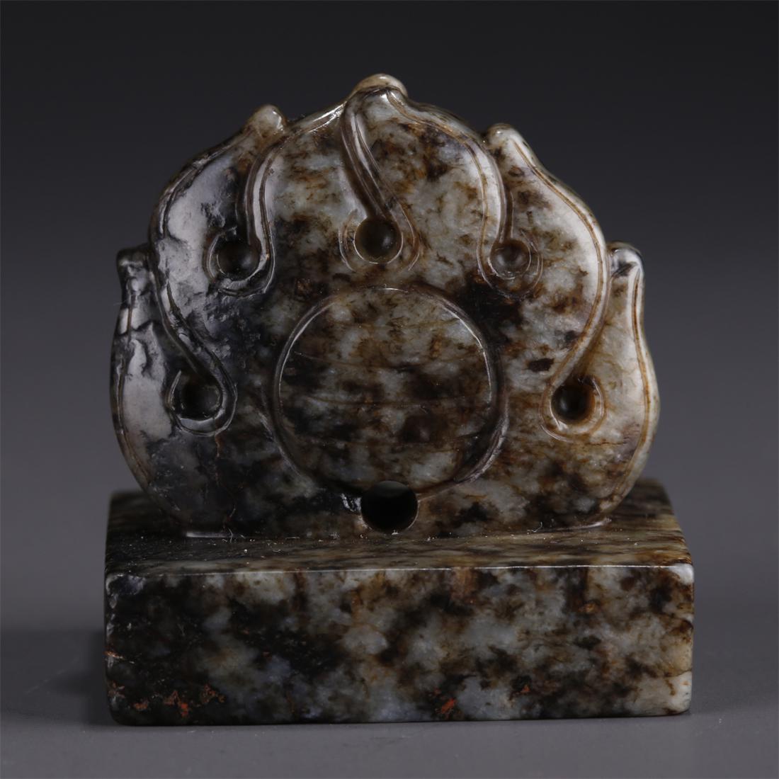 A HETIAN JADE CINTAMANI-KNOB SEAL. (1 of 7)