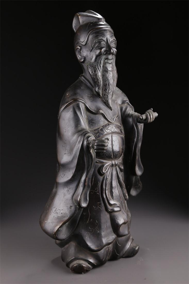 A BRONZE STANDING FIGURE STATUE. (1 of 8)