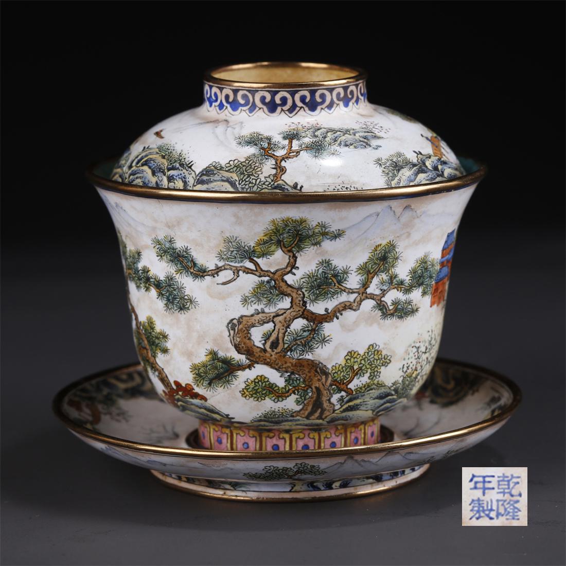 AN ENAMELED BRONZE CUP WITH SAUCER. (1 of 9)