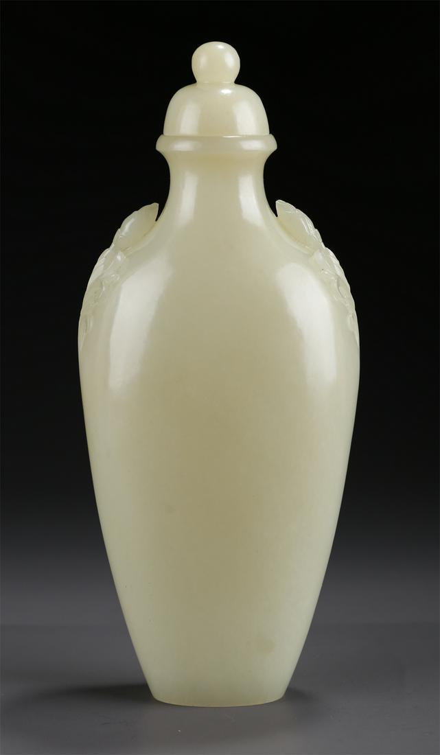 A HETIAN JADE TWO-EAR BOTTLE. (1 of 8)