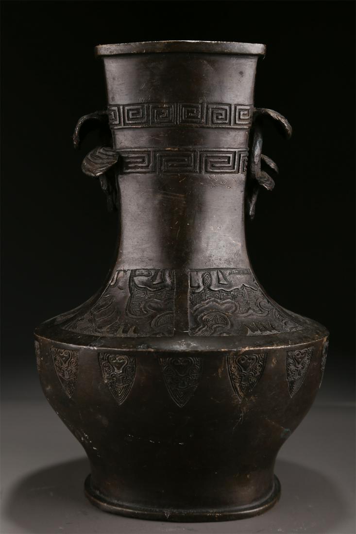 A BRONZE BOTTLE WITH GANODERMA-SHAPED EARS. (1 of 9)