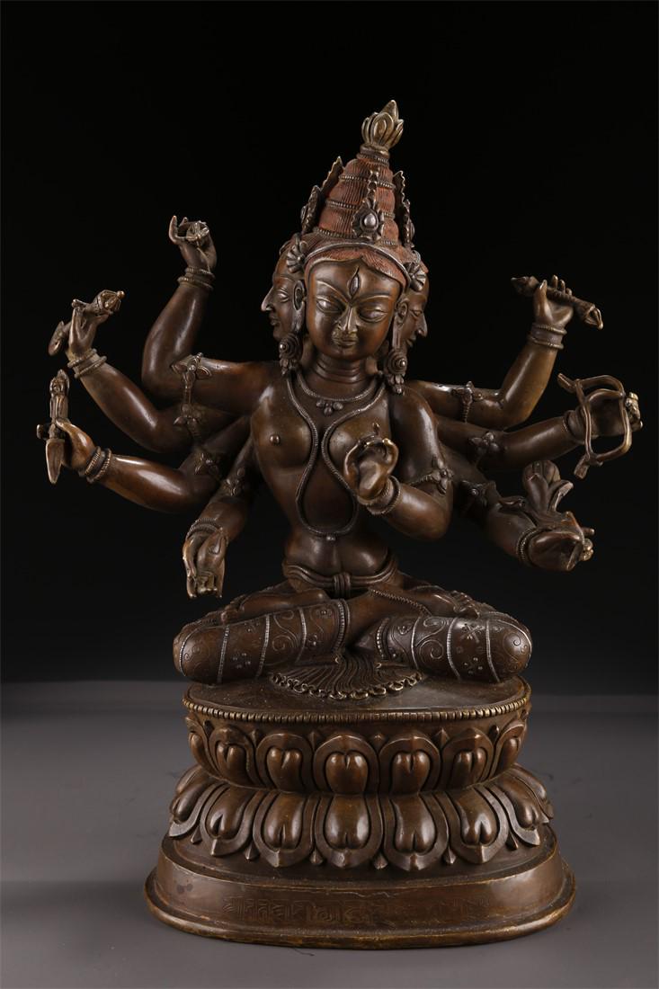 A TIBETAN BRONZE NAMGYALMA BUDDHA STATUE. (1 of 10)