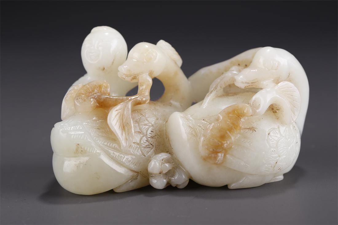 A HETIAN JADE BOY AND DUCK CARVING ORNAMENT. (1 of 9)