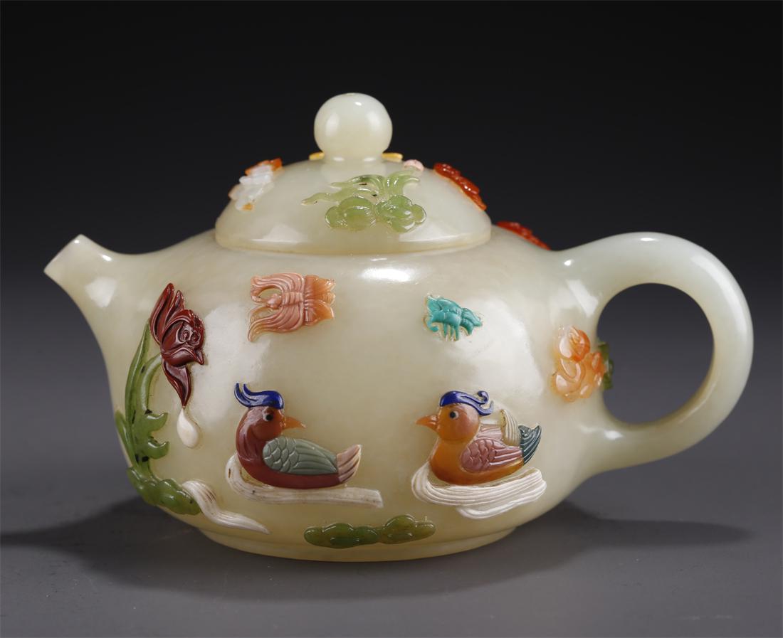 A HETIAN JADE HANDLED POT, INLAID WITH JEWELS. (1 of 9)