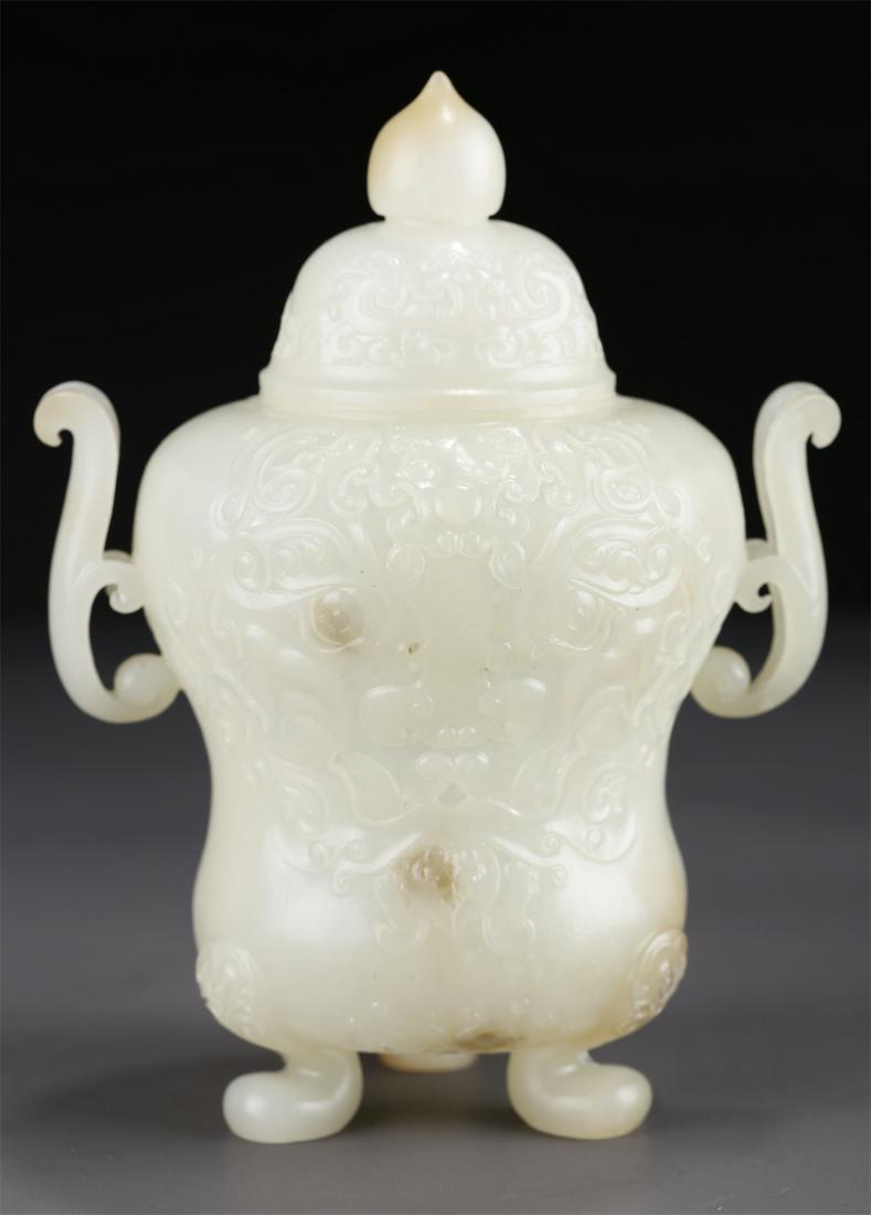 A HETIAN JADE LIDDED CENSER WITH TWO EARS. (1 of 8)