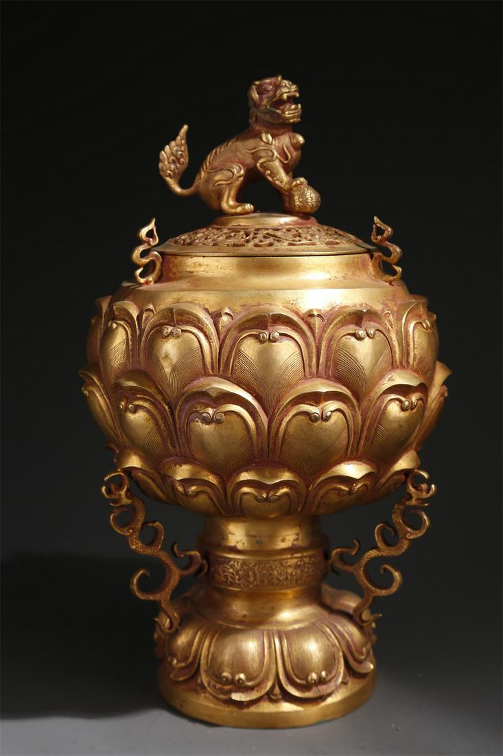 A GILT BRONZE LION-KNOB INCENSE BURNER. (1 of 9)