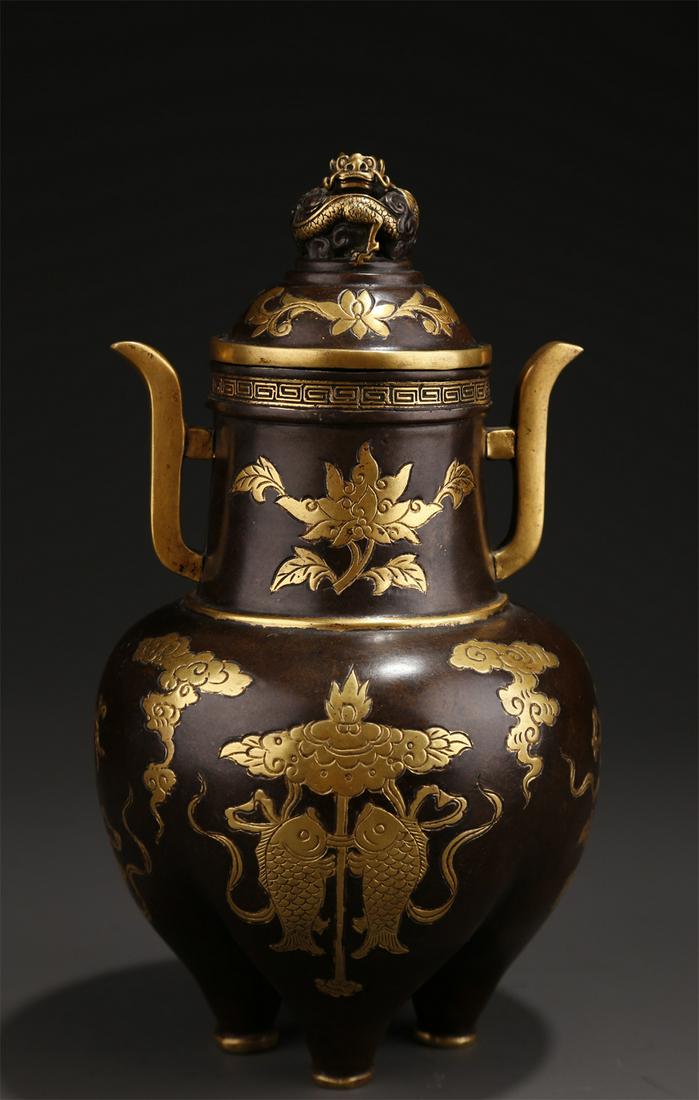 A BRONZE INCENSE BURNER WITH TREASURES DESIGN. (1 of 9)