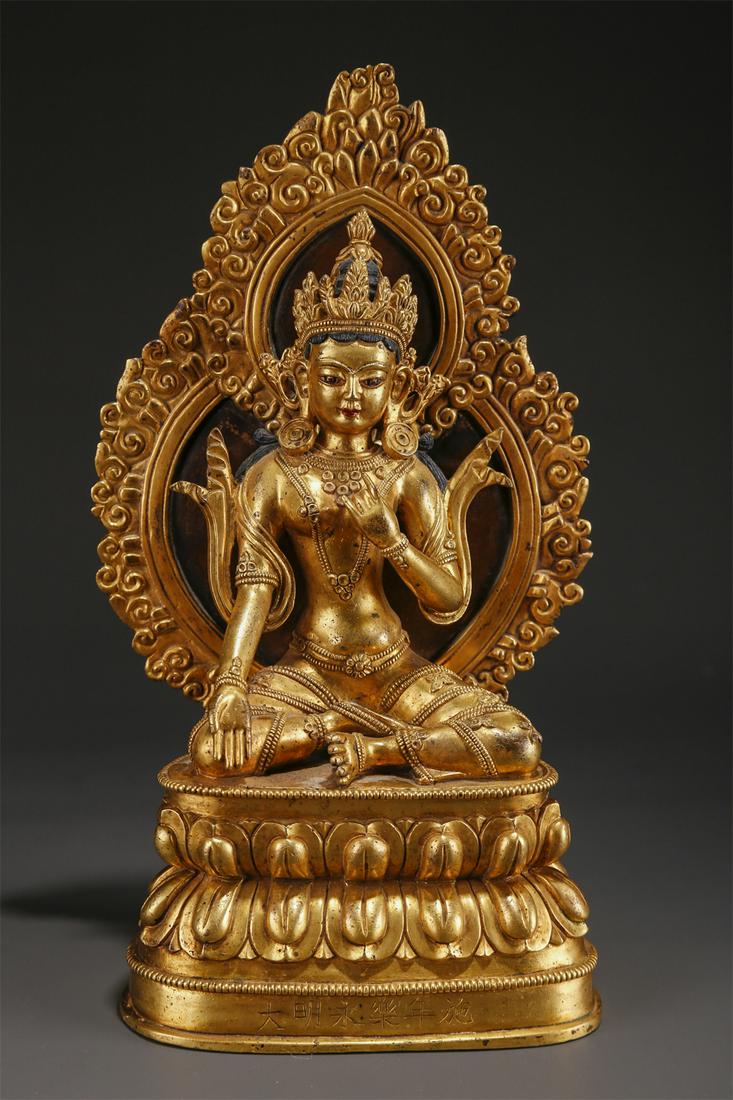 A GILT BRONZE WHITE TARA BUDDHA STATUE. (1 of 10)
