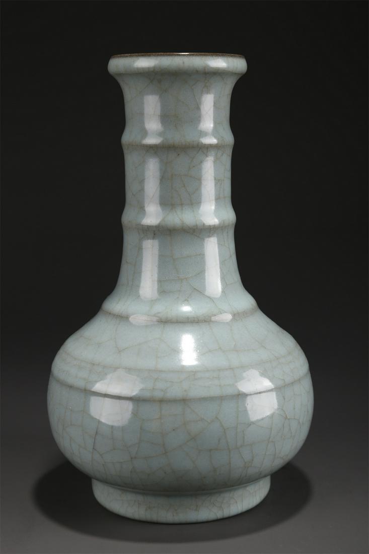 A PORCELAIN BOTTLE WITH STRING DESIGN. (1 of 7)