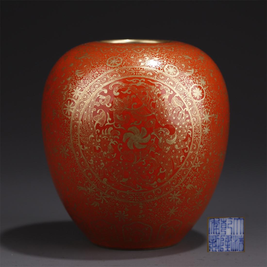 A CORAL-RED GLAZED PORCELAIN WATER CONTAINER. (1 of 7)