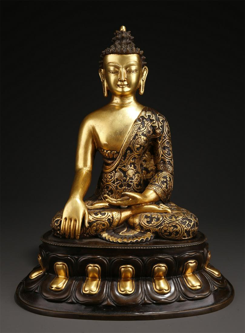 A BRONZE SAKYAMUNI BUDDHA STATUE. (1 of 10)