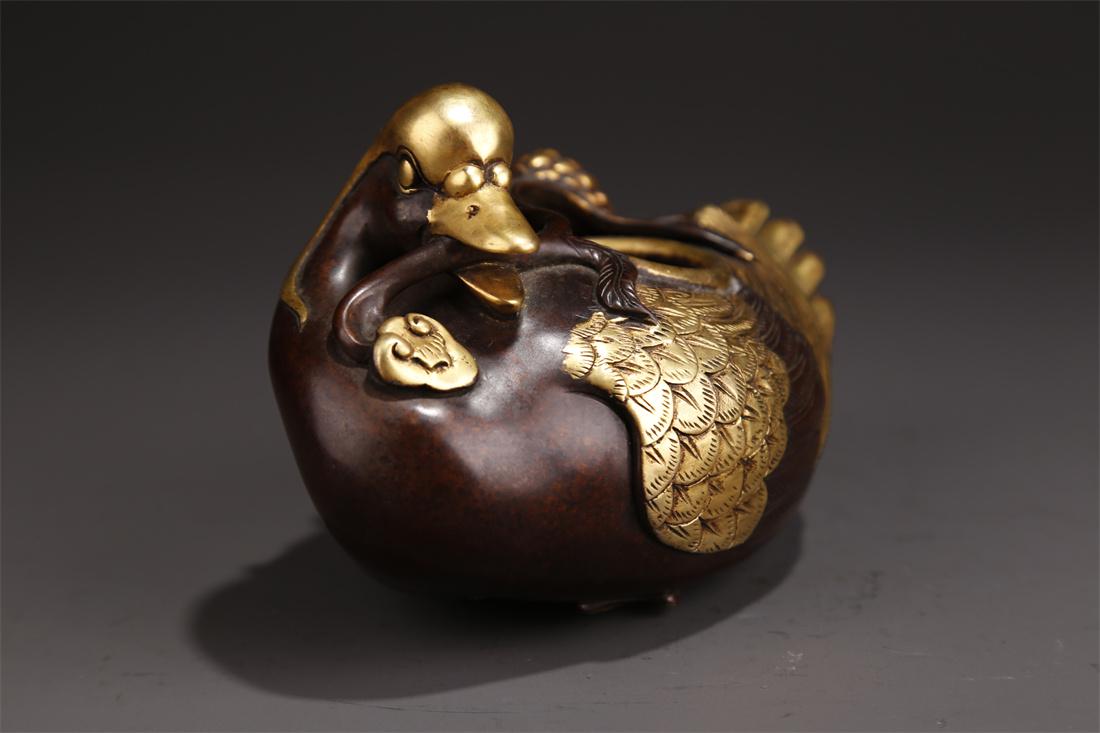 A GOOSE-SHAPED BRONZE WATER CONTAINER. (1 of 9)