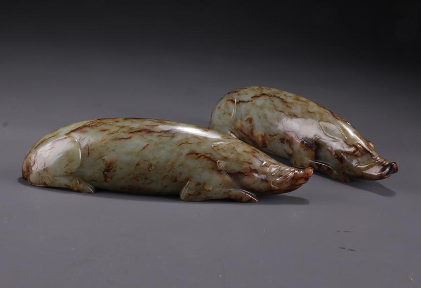 A SET OF ANTIQUE JADE HANDHELD CARVINGS.: A Set of Antique Jade Handheld Carvings.