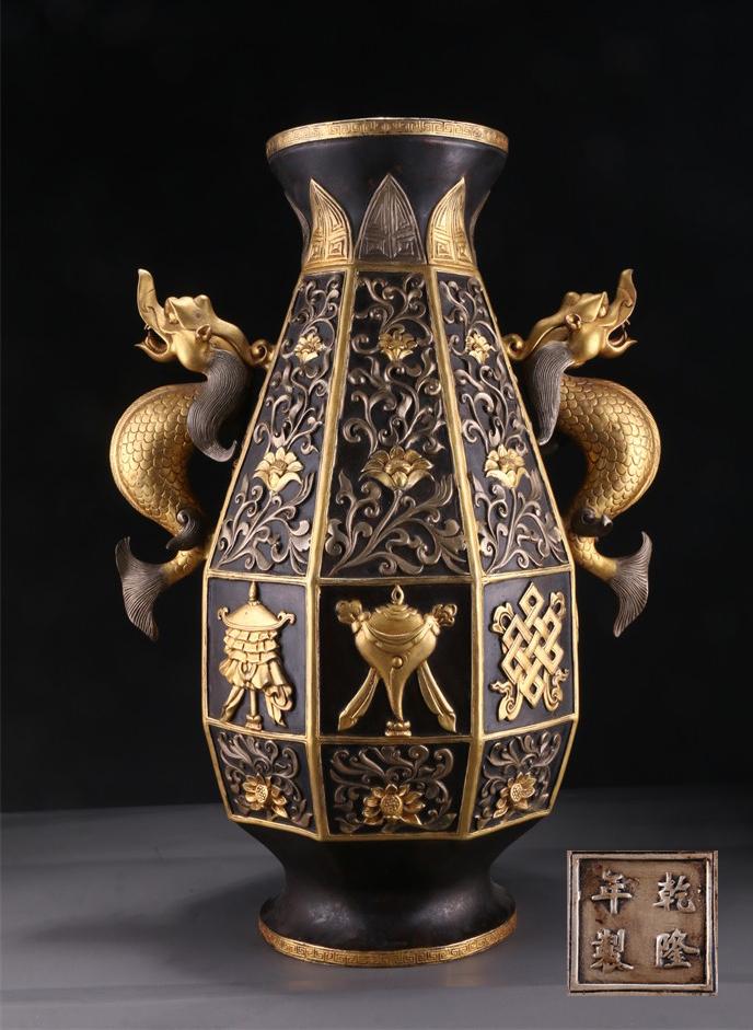 A BRONZE BOTTLE WITH PASSIONFLOWERS DESIGN. (1 of 10)