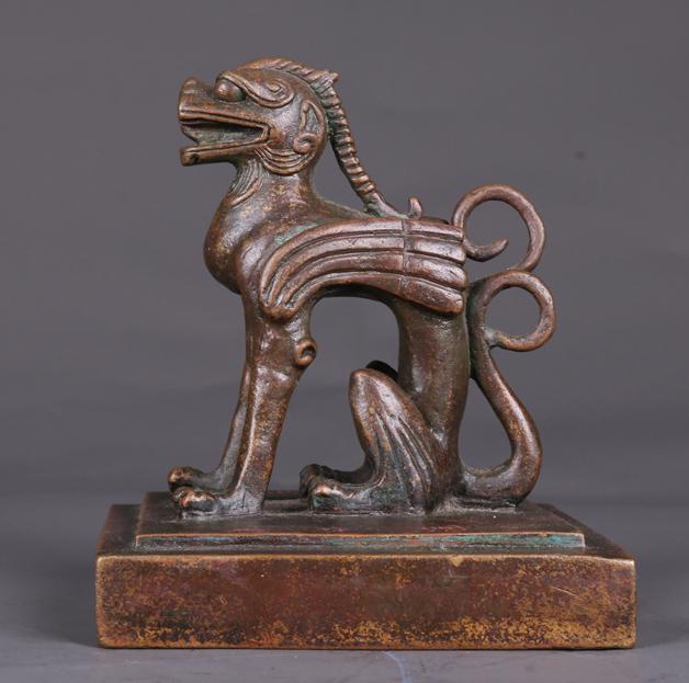 A BEAST-KNOB BRONZE SEAL. (1 of 9)