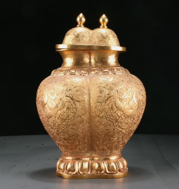A GILT BRONZE CONJOINED BOTTLE WITH LID. (1 of 10)
