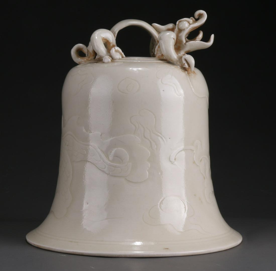 A PORCELAIN BELL WITH DRAGON DESIGN, XING KILN. (1 of 11)
